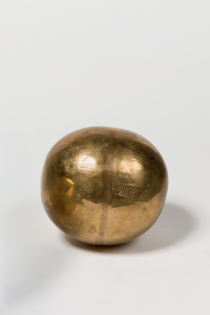 Ado Chale (1928-2025) Ball: Ado Chale (1928-2025) Ball Polished and gilded cast bronze Model created circa 1973 H 21,5 × L 16 cm Bibliography: I. Chale, ‘Ado Chale’, Ed. Aparté, 2017, p. 57 The buyer can