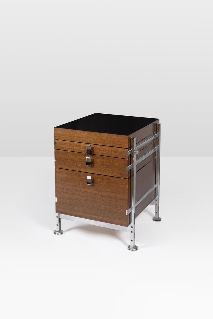 Jules Wabbes (1919-1974) Storage unit: Jules Wabbes (1919-1974) Storage unit Wood veneer, black melamine and chromed steel Model created circa 1960 H 69 × L 52,5 × W 58 cm Bibliography: M. Ferran-Wabbes, ‘Jules Wabbes,