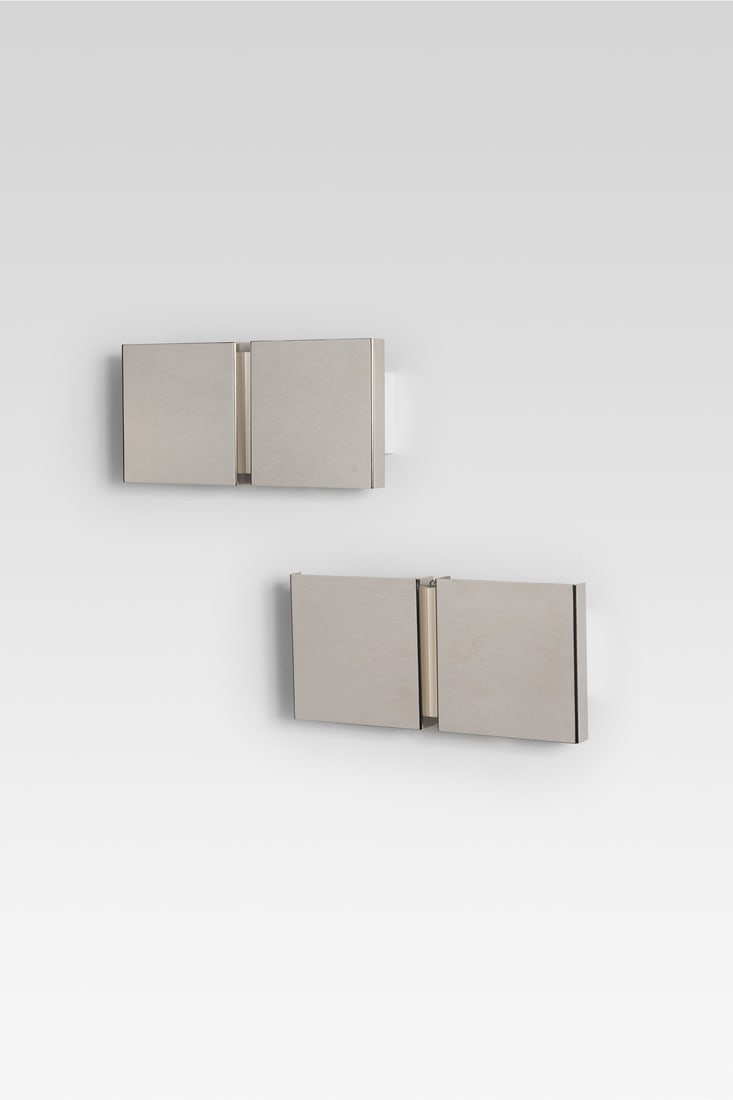Christophe Gevers (1928-2007) Pair of sconces - Model 'GE20': Christophe Gevers (1928-2007) Pair of sconces - Model 'GE20' Chromed and lacquered brass Edited by Light Model created in 1971 H 18 × L 38 × W 8 cm