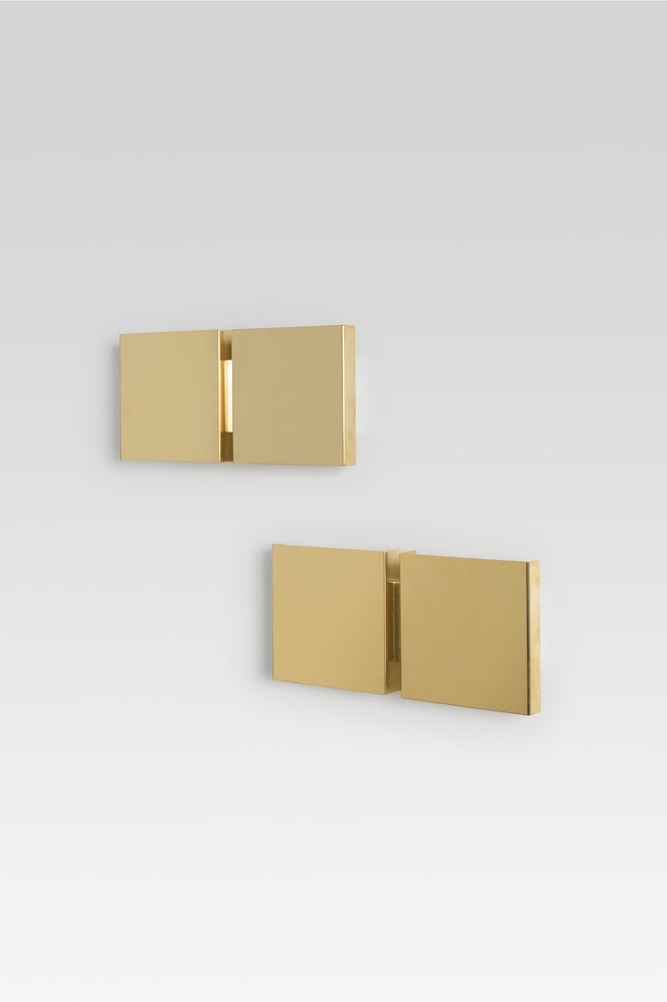 Christophe Gevers (1928-2007) Pair of sconces - Model 'GE20': Christophe Gevers (1928-2007) Pair of sconces - Model 'GE20' Gilded and lacquered brass Edited by Light Model created in 1971 H 18 × L 38 × W 8 cm