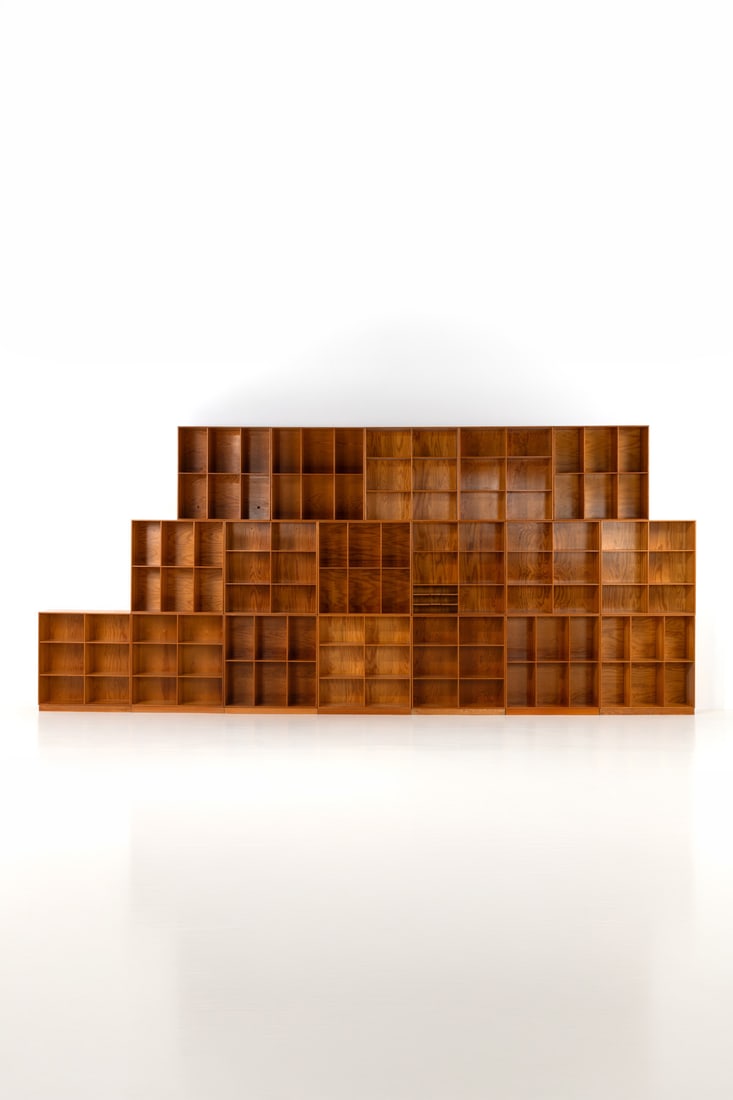 Mogens Koch (1898-1992) Set of seven bases and eighteen: Mogens Koch (1898-1992) Set of seven bases and eighteen modular storage elements Pine Edited by Rud. Rasmussen Manufacturer's label on several elements Model created in 1948 H 233 × L 553 ×