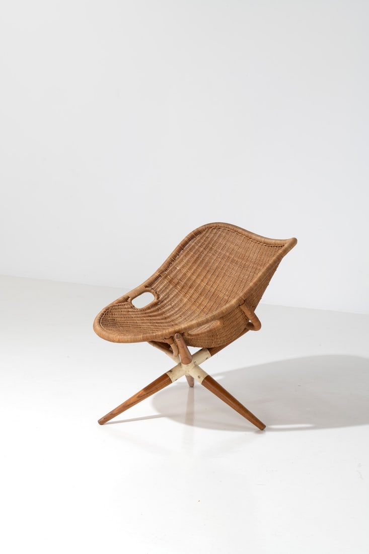 Joseph-André Motte (1925-2013) Fauteuil, 'Chistera': Joseph-André Motte (1925-2013) Fauteuil, 'Chistera' Woven rattan core, wood and lacquered steel Edited by Rougier Model created circa 1949 H 70 × L 75 × W 73 cm Bibliography: - P.