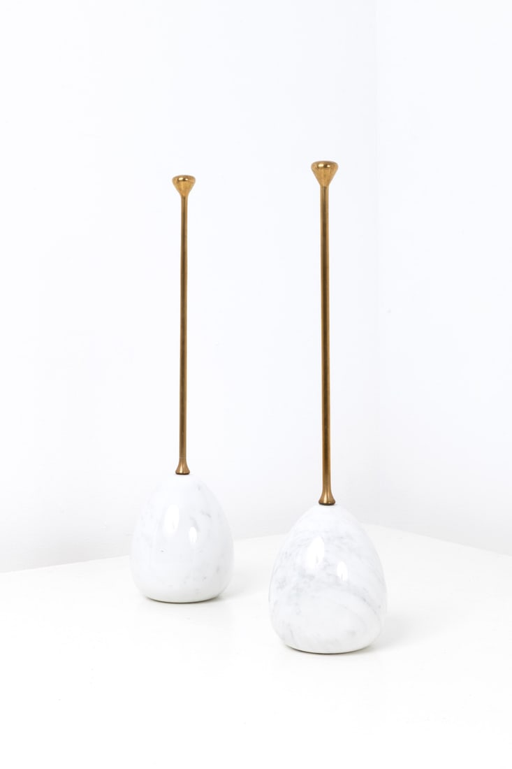 Luigi Caccia Dominioni (1913-2016) Pair of doorstops: Luigi Caccia Dominioni (1913-2016) Pair of doorstops Brass and marble Edited by Azucena Models created in the 1950s H 44 × Ø 11 cm Bibliography: Domus no. 231, Dec. 1948, variant
