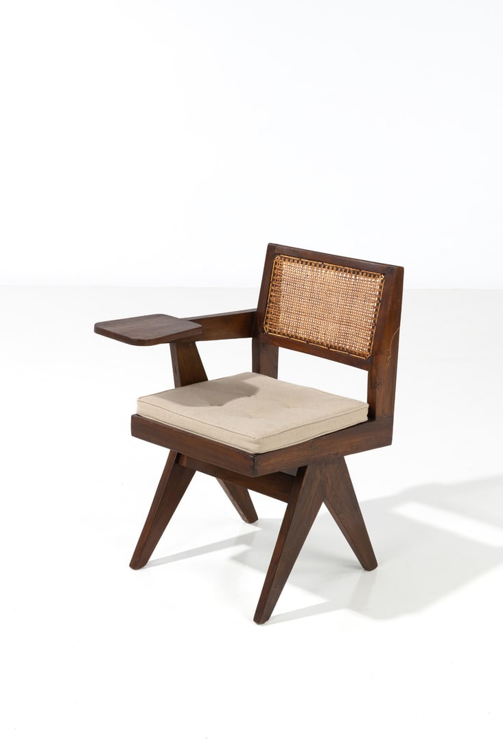 Pierre Jeanneret (1896-1967) Chair with writing tablet: Pierre Jeanneret (1896-1967) Chair with writing tablet Teak, caning and fabric Model created circa 1960 H 82 × L 54,4 × W 58,5 cm Provenance: Administrative buildings, Chandigarh, India