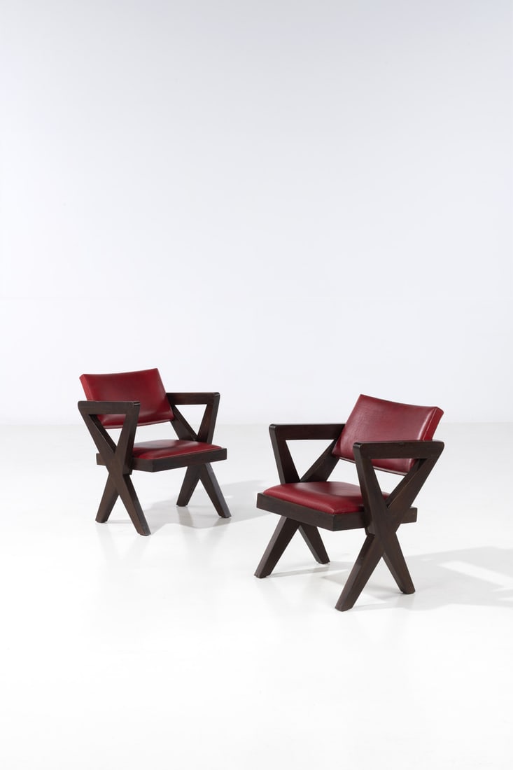 Pierre Jeanneret (1896-1967) Pair of performance hall armchairs: Pierre Jeanneret (1896-1967) Pair of performance hall armchairs Teak and leather Model created circa 1961 H 68 × L 51 × W 55 cm Provenance: Administrative buildings, Chandigarh, India