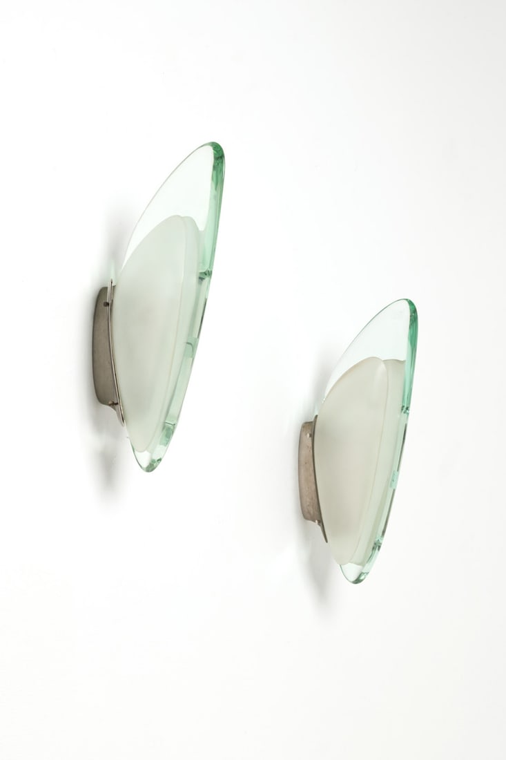 Max Ingrand (1908-1969) Pair of sconces – Model 1552: Max Ingrand (1908-1969) Pair of sconces – Model 1552 Nickel brass, glass and frosted glass Edited by Fontana Arte Model created circa 1957 H 40 × L 9 × W 20 cm Bibliography: - Domus, n