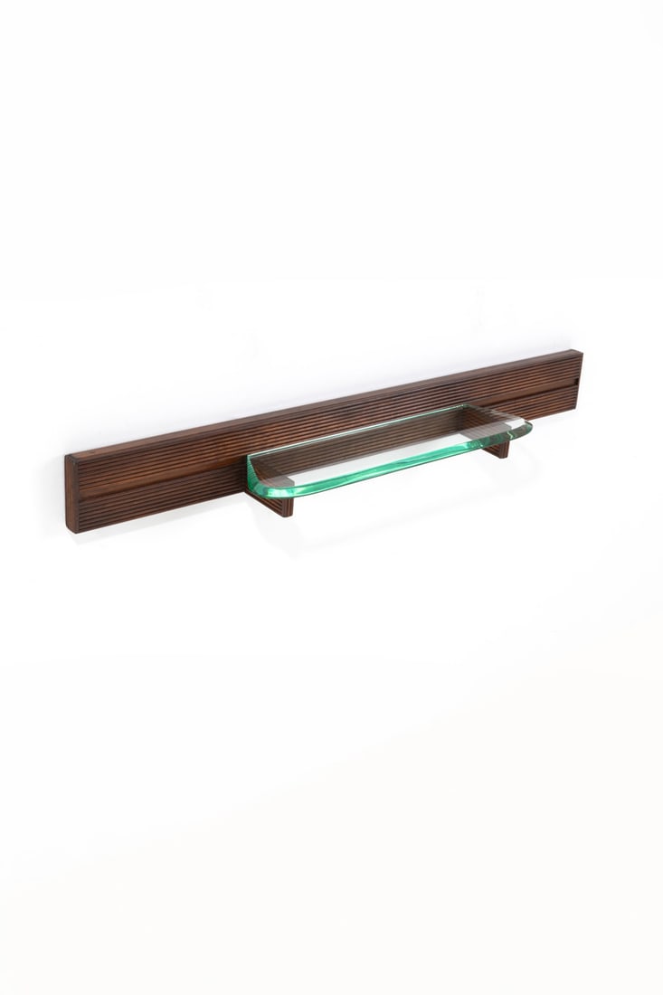 Fontana Arte (Edited by, 20th c.) Wall-mounted console: Fontana Arte (Edited by, 20th c.) Wall-mounted console Walnut and glass Edited by Fontana Arte Model created circa 1950 H 16 x L 146 x P 23 cm