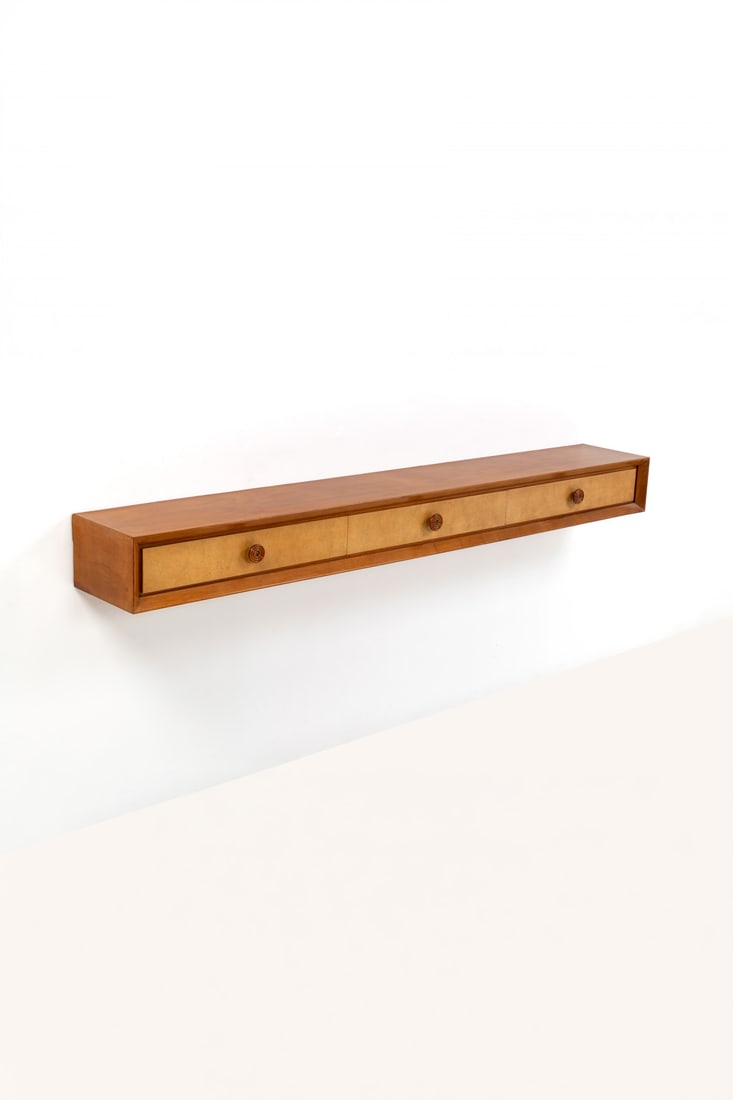 Osvaldo Borsani (1911-1985) Wall-mounted console: Osvaldo Borsani (1911-1985) Wall-mounted console Birch burl veneer, boxwood and turned wood Edited by Arredamenti Borsani, Varedo Models created in the 1940s H 21 × L 220 × W 32 cm