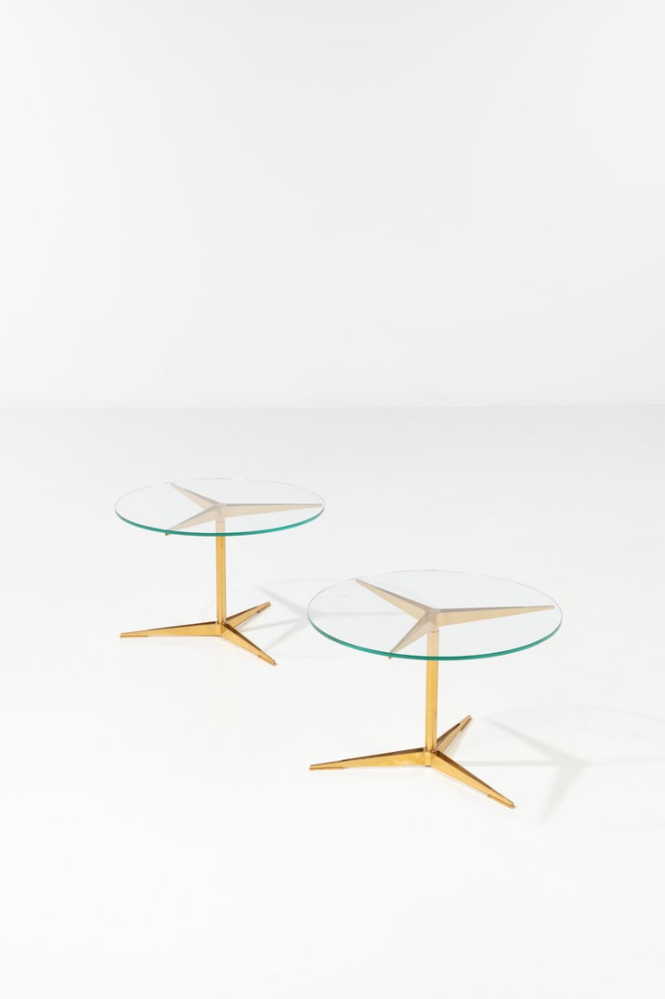 Gio Ponti (1891-1979): Gio Ponti (1891-1979) Pair of tables - Model no. 1128 Brass and glass Edited by Singer and Sons Model created circa 1951 H 41,5 × Ø 62 cm Expertise conducted by the Gio Ponti Archives.