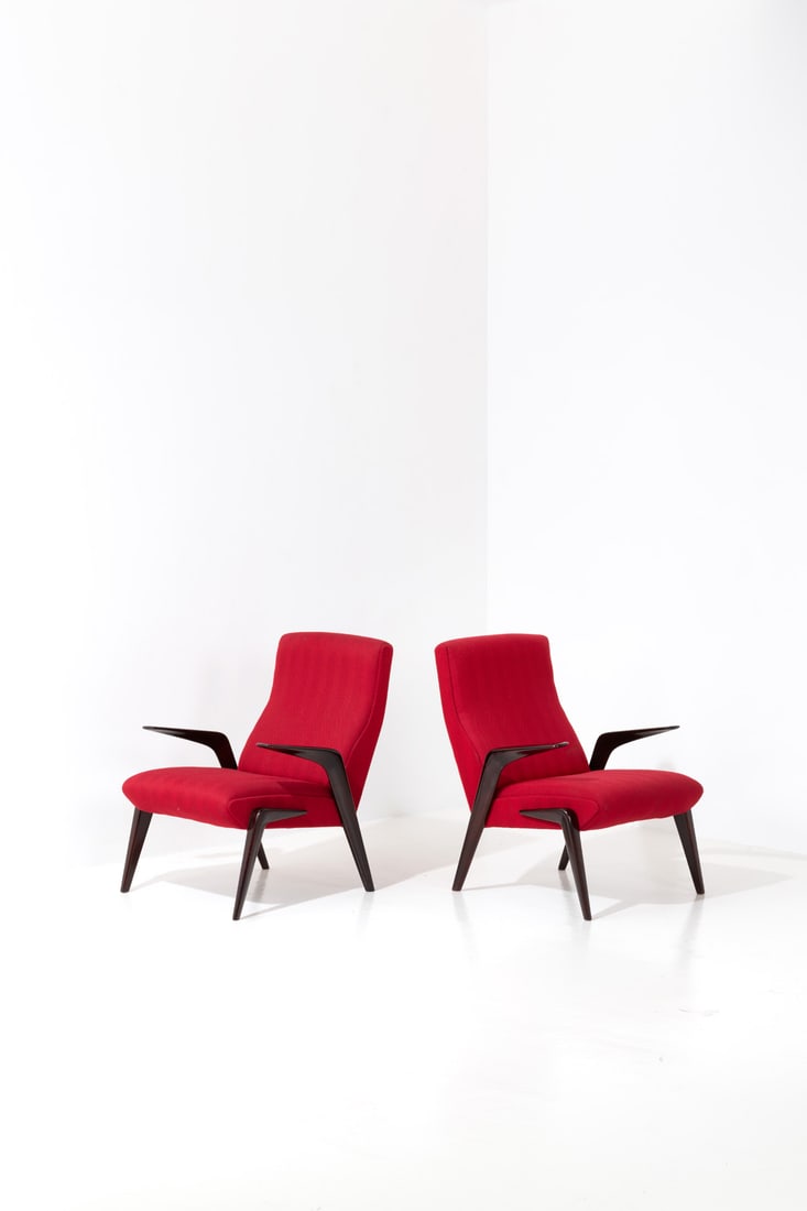 Osvaldo Borsani (1911-1985) Pair of armchairs - Model n°P71: Osvaldo Borsani (1911-1985) Pair of armchairs - Model n°P71 Lacquered wood and fabric Edited by Tecno Model created circa 1951-1954 H 86 × L 67 × W 72 cm Bibliography: - F. Irace & G.