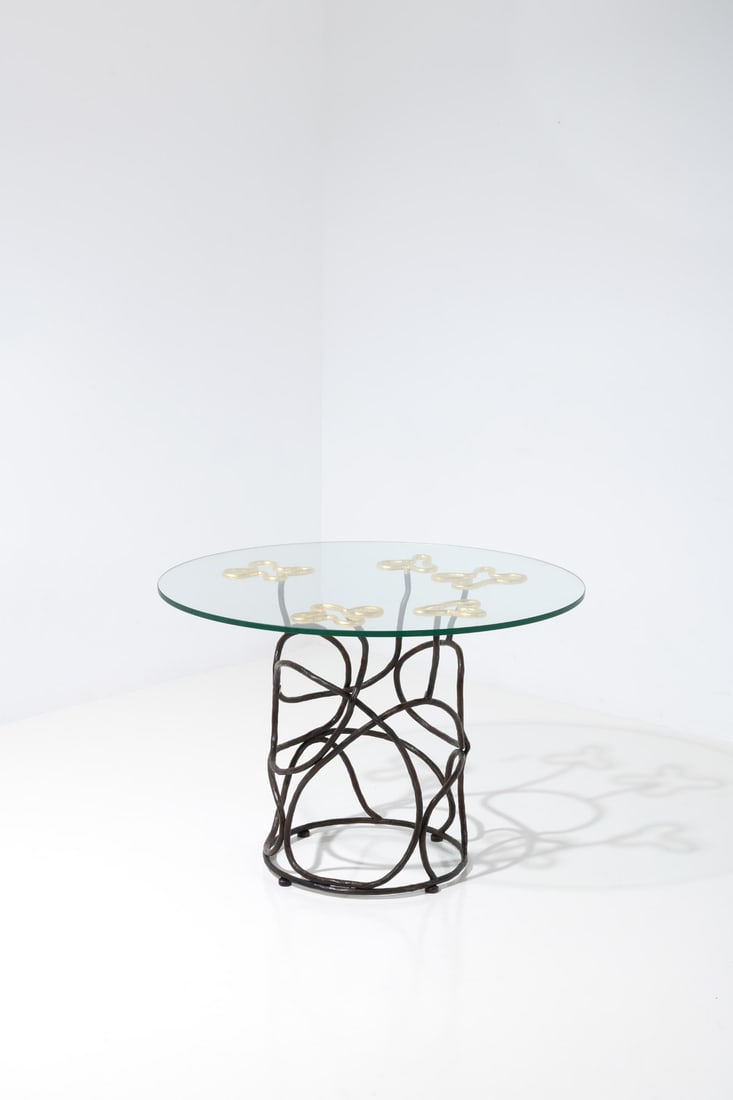 Elizabeth Garouste (born 1946) Dining table - 'Zeus' Model Unique piece: Elizabeth Garouste (born 1946) Dining table - 'Zeus' Model Unique piece Patinated wrought iron with gold leaf and glass Monogrammed 'EG' Model created in the 2000s H 76 × Ø 110 cm