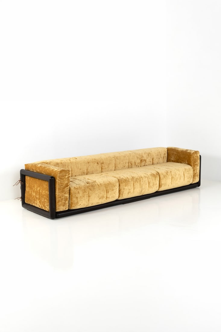 Carlo Scarpa (1906-1978) Sofa - 'Cornaro' Model: Carlo Scarpa (1906-1978) Sofa - 'Cornaro' Model Tinted wood and velvet Edited by Gavina Model created circa 1973 H 65 × L 300 × W 87 cm Bibliography: V. Vercelloni, 'The Adventure of Design: