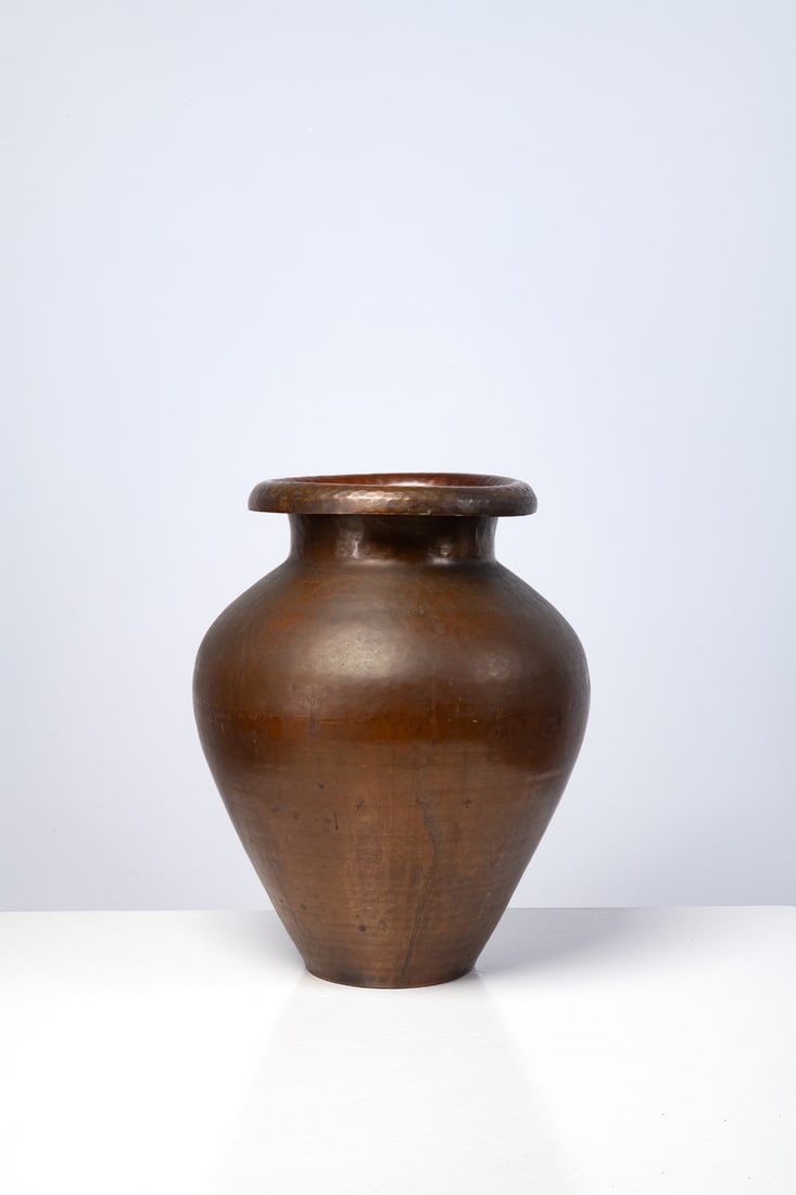 Nino Ferrari (edited by, 20th c.) Vase: Nino Ferrari (edited by, 20th c.)VasePatinated hammered copperEdited by Nino FerrariManufacturer’s stampModel created in the 1930sH 49 × Ø 35 cm