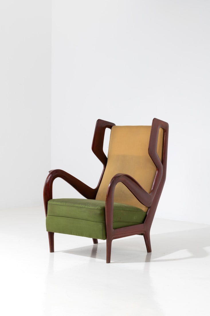 x Gio Ponti (1891-1979) Armchair: x Gio Ponti (1891-1979)ArmchairWalnut and fabricEdited by Ariberto ColomboModel created in the 1950sH 102×L 69×W 80cmBibliography:- I. de Guttry & M-P. Maino, 'Il mobile italiano