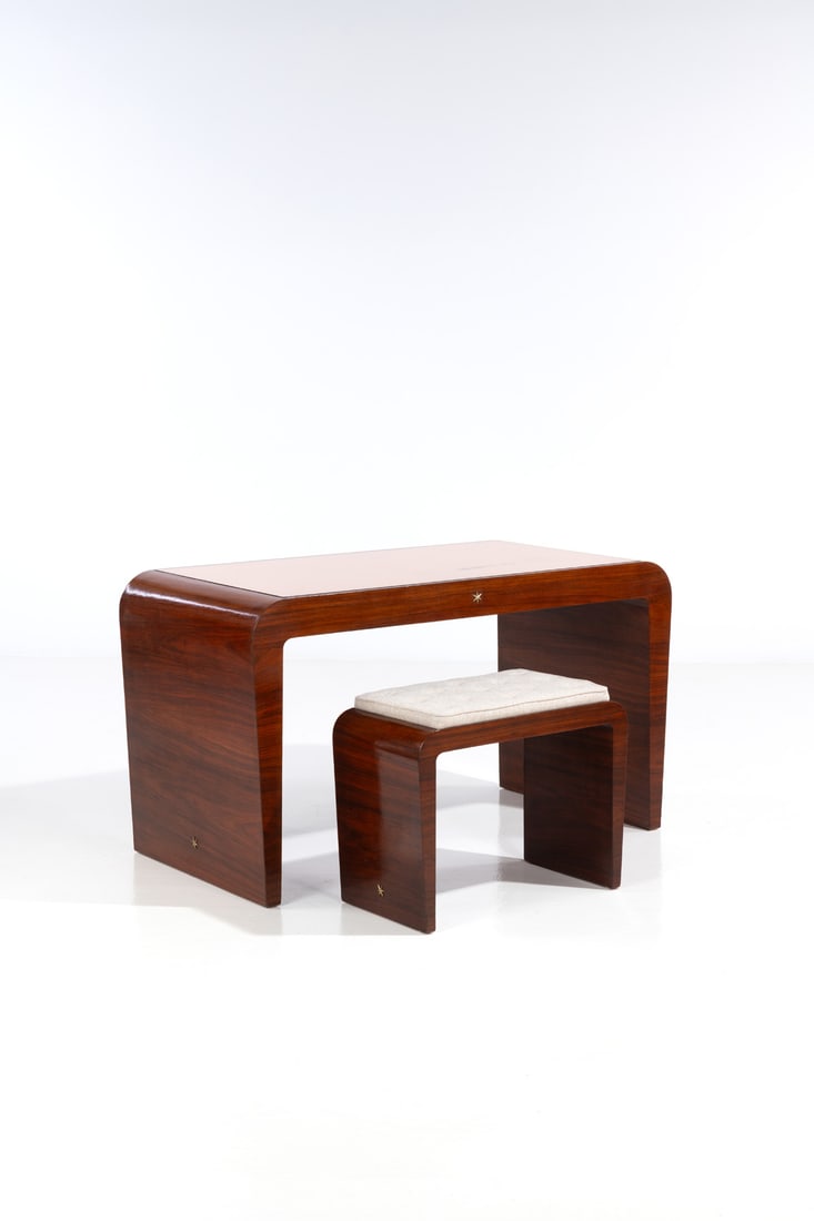 Gio Ponti (1891-1979) Desk and its stool: Gio Ponti (1891-1979)Desk and its stoolWood, stained walnut veneer, mirrored stainedglass, brass and fabricEdited by Fontana ArteStamped with 'L. FONTANA & CO 18 FEV1938' on the back of the