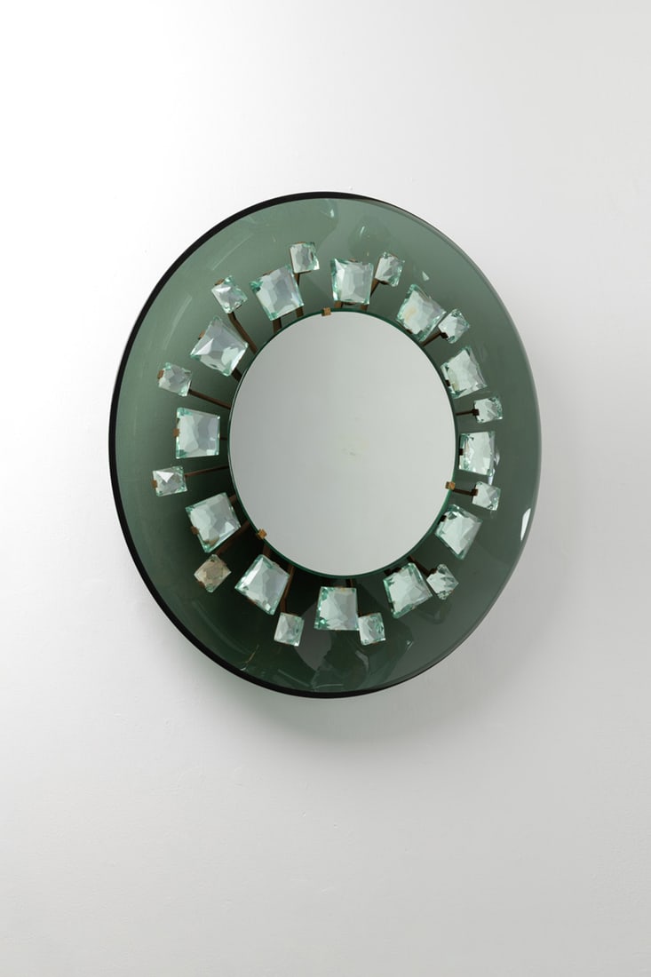 Max Ingrand (1908-1969) Illuminated mirror - Model no. 2044, 'Pistil': Max Ingrand (1908-1969)Illuminated mirror - Model no. 2044, 'Pistil'Brass, glass, cut glass and mirrorEdited by Fontana ArteModel created circa 1960Ø 75 × W 15 cmBibliography:- F. Deboni, 'F