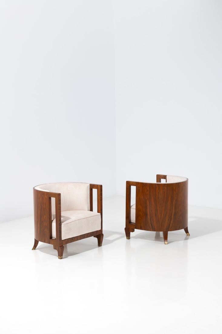 Gio Ponti (1891-1979) Pair of armchairs: Gio Ponti (1891-1979)Pair of armchairsWalnut, brass and fabricEdited by Magnoni and E. QuartiModel created in the 1930sH 59 × L 59 × W 48,5 cmExpertise conducted by the Gio Ponti Archives.