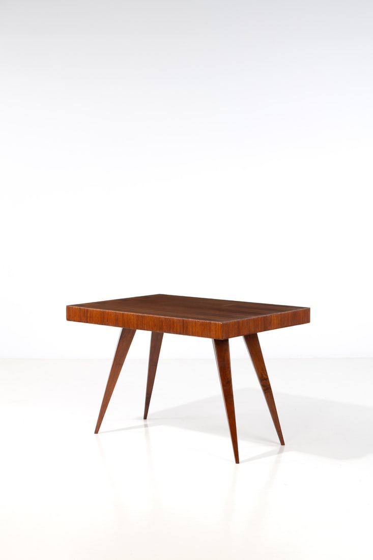 Gio Ponti (1891-1979) Table: Gio Ponti (1891-1979)TableWalnut and walnut veneerModel created in the 1940sH 80 × L 114,5 × W 85 cmExpertise conducted by the Gio Ponti Archives.