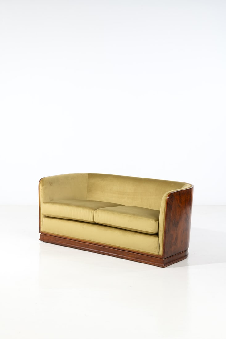 Gio Ponti (1891-1979) Sofa: Gio Ponti (1891-1979)SofaBurl veneer and fabricEdited by Mario QuartiManufacturer’s plaque 'E. QVARTI SA - Milano'Model created in the 1930sH 66,5 × L 155 × W 72,5 cmExpertise