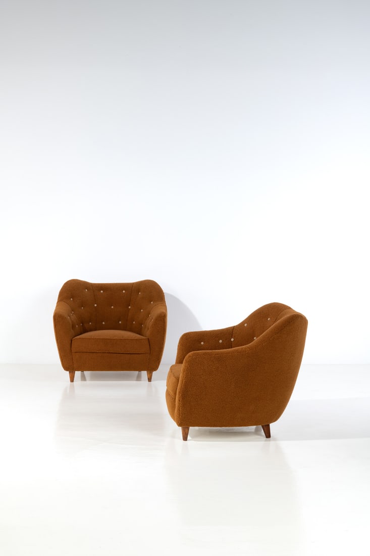 Gio Ponti (1891-1979) Pair of armchairs: Gio Ponti (1891-1979)Pair of armchairsWalnut fabricEdited by CassinaModel created in the 1930sH 86 × L 96 × W 85 cmExpertise conducted by the Gio Ponti Archives.