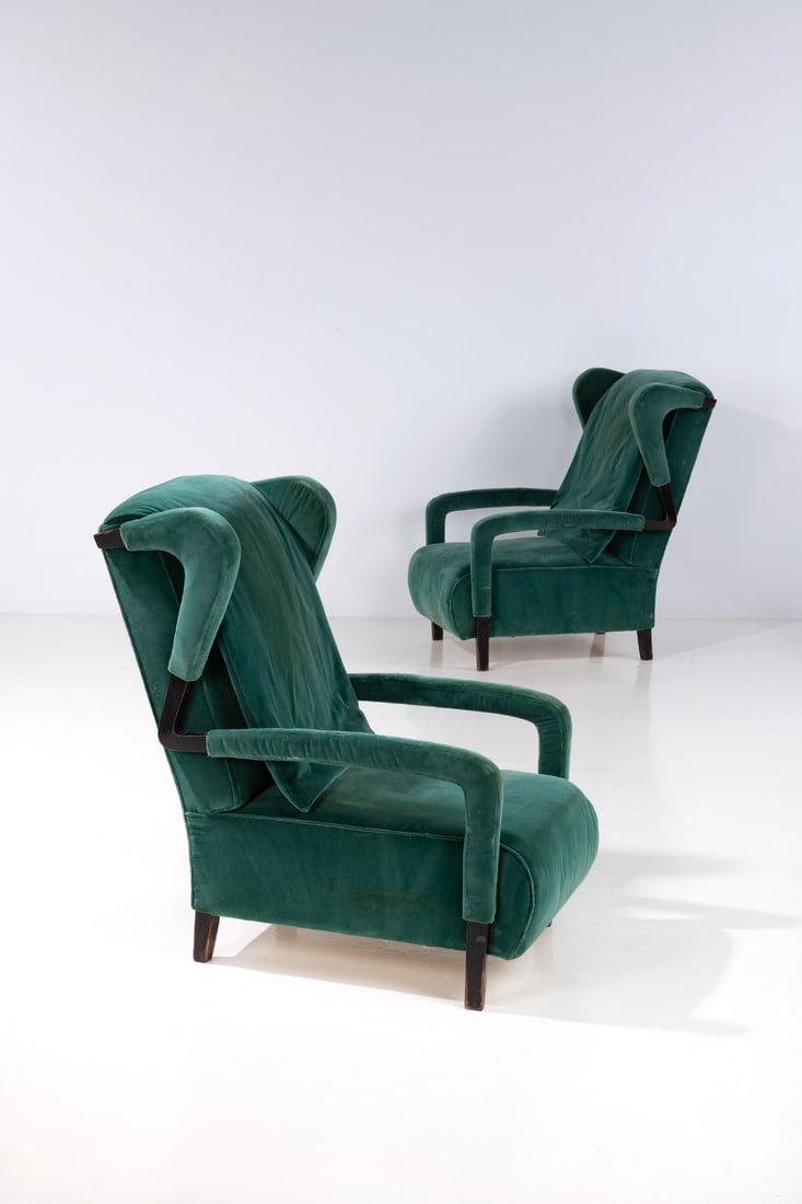 Gio Ponti (1891-1979) Pair of armchairs: Gio Ponti (1891-1979)Pair of armchairsLacquered walnut and fabricModel created circa 1933H 72 × L 66 × W 96 cmExpertise conducted by the Gio Ponti Archives.