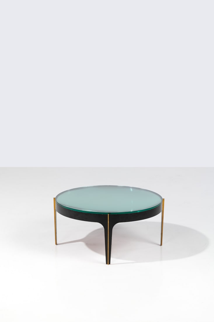 Max Ingrand (1908-1969) Coffee table - Model 1774: Max Ingrand (1908-1969)Coffee table - Model 1774Lacquered metal, brass, stained glass and mirrorglassEdited by Fontana ArteModel created circa 1958H 37,5 × Ø 83 cmBibliography: F. Deboni,