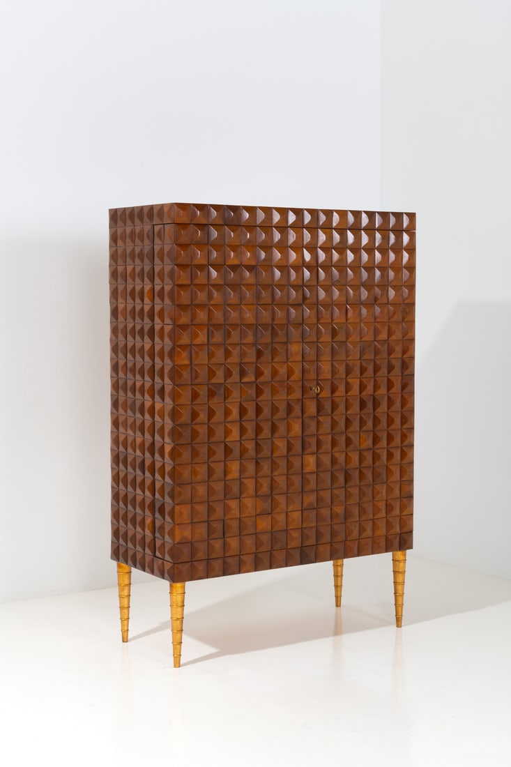 Paolo Buffa (1903-1970) Cabinet: Paolo Buffa (1903-1970)CabinetGilded wood, varnished walnut, mirror and glassProduction Mario QuartiModel created in the 1940sH 151,5 × L 101 × W 44,5 cmBibliography: R. Aloi,