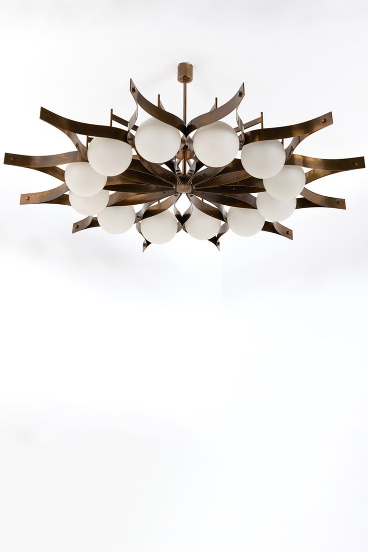 Gio Ponti (1891-1979) 12-light suspension - Model 'Pavone': Gio Ponti (1891-1979)12-light suspension - Model 'Pavone'Brass and satin glassEdited by ArredoluceModel created circa 1964H 83 × Ø 175 cmProvenance: Model created for the Nemazee Villa,Tehra