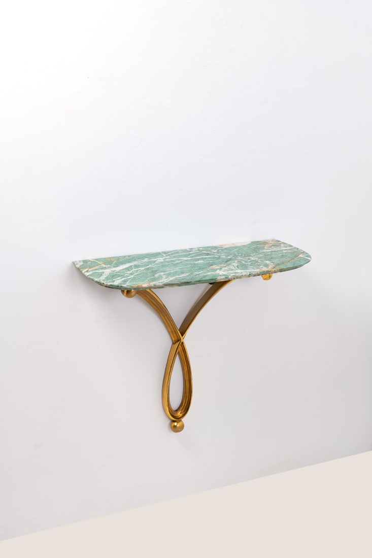 Osvaldo Borsani (1911-1985) Console: Osvaldo Borsani (1911-1985)ConsoleGilded wood and marbleEdited by Arredamenti Borsani VaredoModel created circa 1949H 68 × L 73 × W 30,5 cmBibliography: G. Bosoni, 'Osvaldo