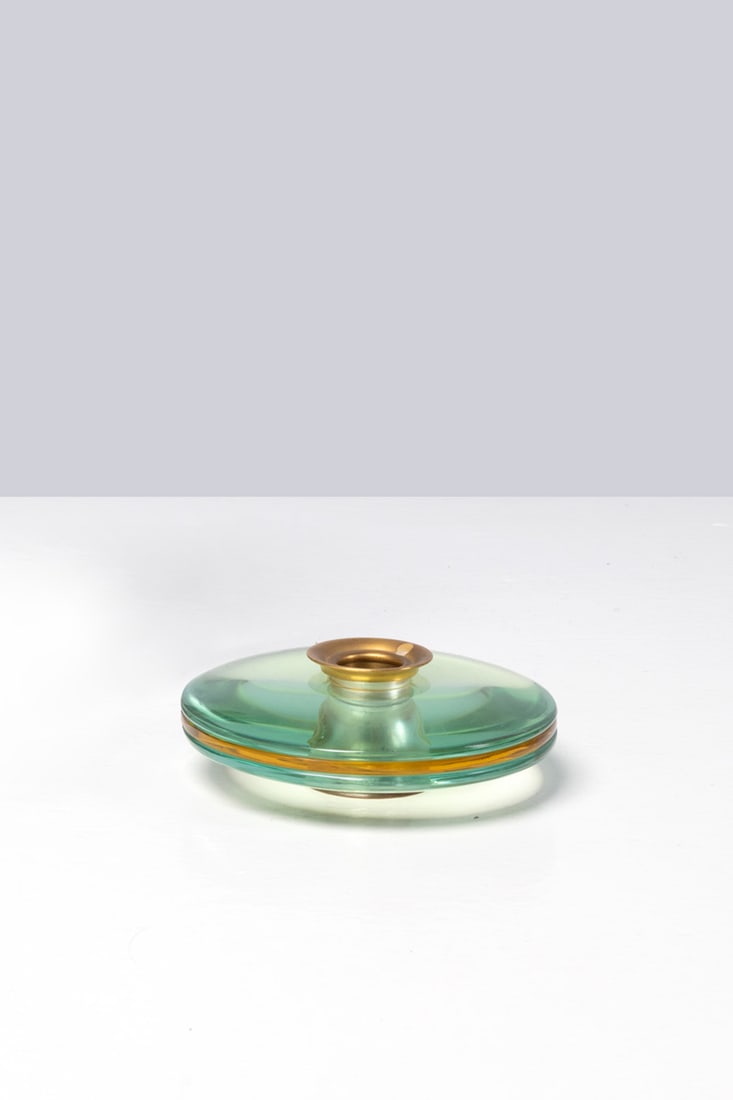 Max Ingrand (1908-1969) Candlestick: Max Ingrand (1908-1969)CandlestickBrass and glassEdited by Fontana ArteModel created circa 1958H 5,5 × Ø 14,5 cmBibliography: 'Lastre di vetro e cristallo', Vitrum,no. 146, Novembre-Decembre