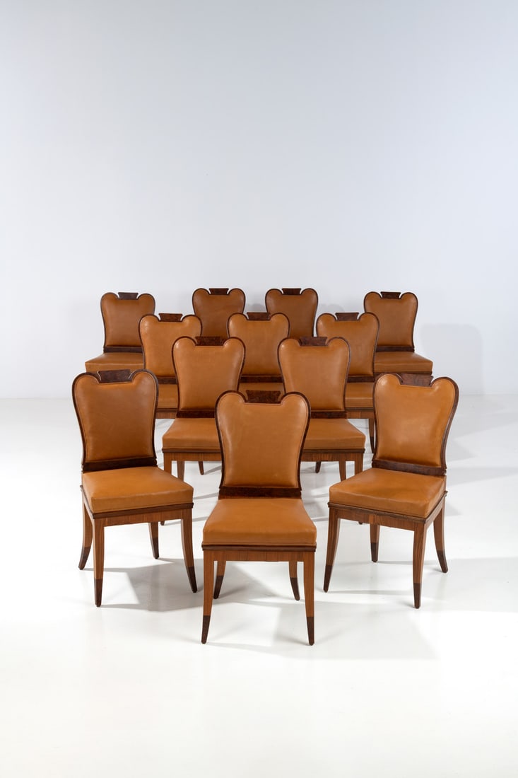 Emilio Lancia (1890-1973) Set of twelve chairs: Emilio Lancia (1890-1973)Set of twelve chairsRadica veneer, rosewood and leatherModel created in the 1930sH 89 × L 48 × W 49 cm