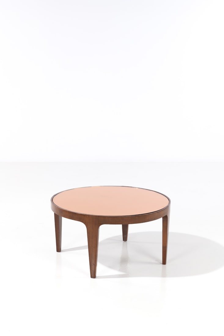 Fontana Arte (edited by, 20th c.) Coffee table - Model 1774: Fontana Arte (edited by, 20th c.)Coffee table - Model 1774Wood and mirror stained glassEdited by Fontana ArteManufacturer’s labelModel created circa 1959H 41 × Ø 70 cmBibliography:- L.