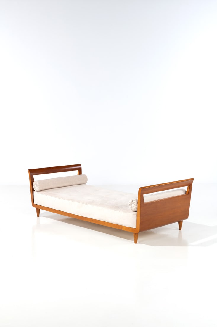 Gio Ponti (1891-1979) Daybed: Gio Ponti (1891-1979)DaybedFruitwood and fabricModel created circa 1935H 66 × L 210 × W 96 cmProvenance: Model created for the 'Domus Alba' viaGoldoni, Milan, circa 1935.Expertise conducted