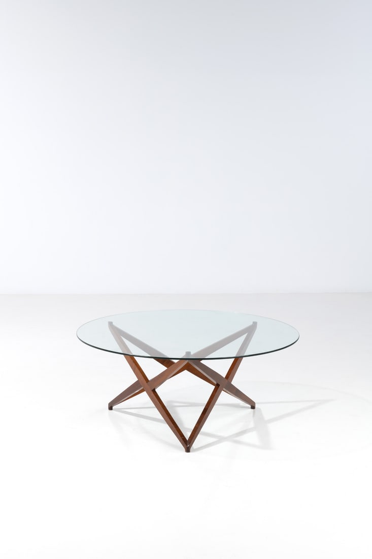 Angelo Ostuni (20th c.) Coffee table: Angelo Ostuni (20th c.)Coffee tableWood and glassEdited by FrangiModel created circa 1950H 45 × Ø 104 cm