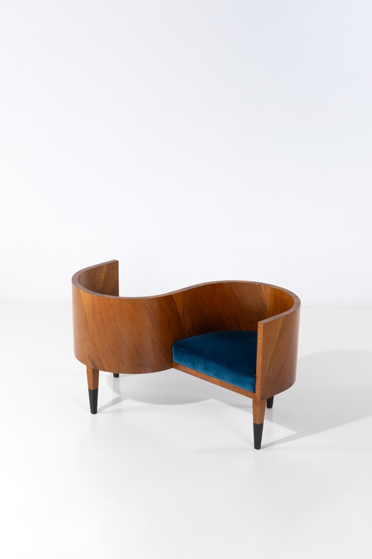 Gio Ponti (1891-1979) Confidante: Gio Ponti (1891-1979)ConfidanteWalnut, lacquered wood and fabricModel created in the 1930sH 70 × L 125 × W 80 cmBibliography:- Domus no. 49, January 1932- Domus no. 93, September 1935 p.