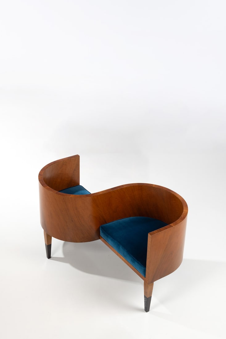 Gio Ponti (1891-1979) Confidante: Gio Ponti (1891-1979)ConfidanteWalnut, lacquered wood and fabricModel created in the 1930sH 70 × L 125 × W 80 cmBibliography:- Domus no. 49, January 1932- Domus no. 93, September 1935 p.