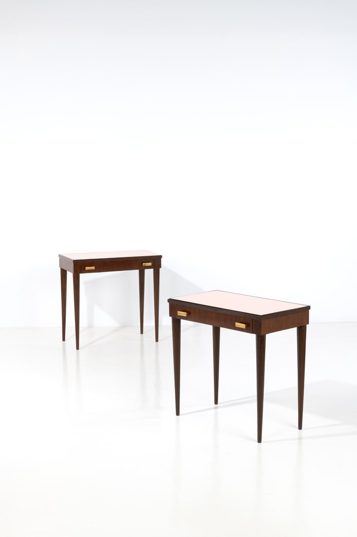 Gio Ponti (1891-1979) Pair of consoles: Gio Ponti (1891-1979)Pair of consolesStained walnut, brass and mirrored stained glassEdited by Fontana ArteModel created in the 1940sH 77,5 × L 80,5 × W 45 cmExpertise conducted by the Gio P