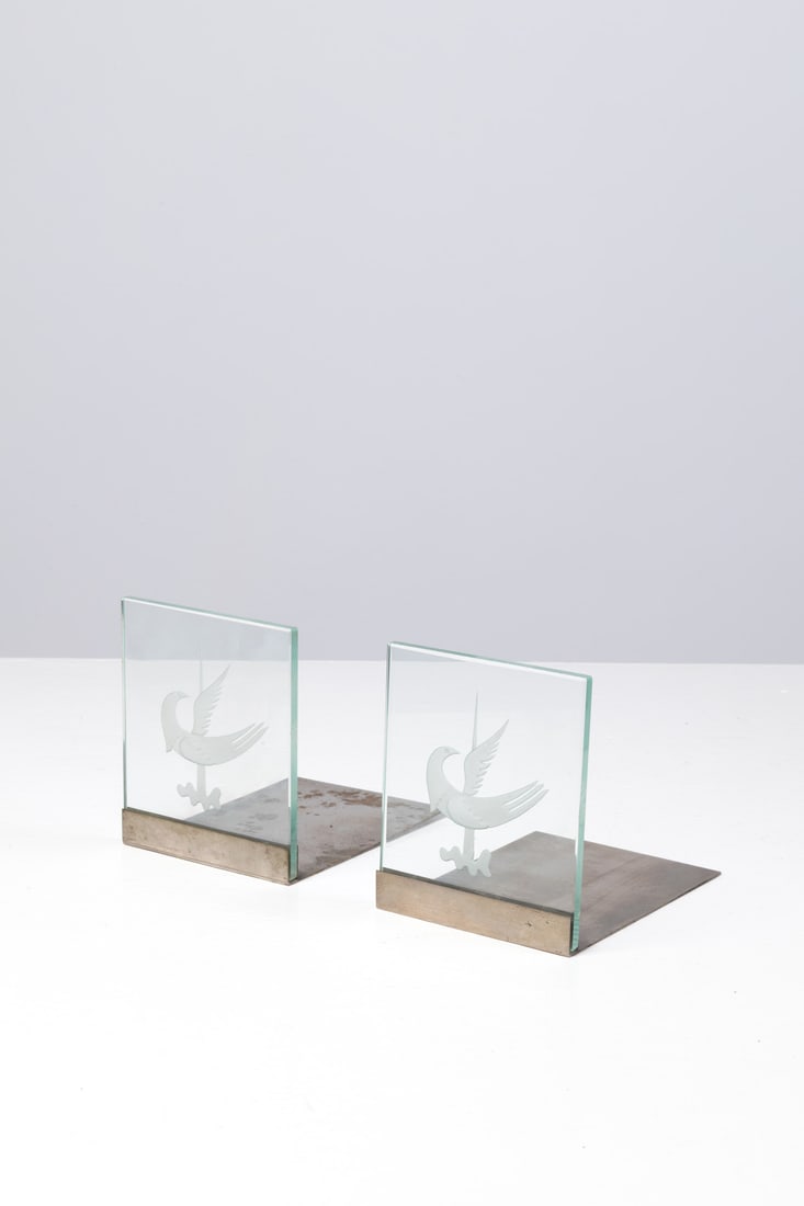 Gio Ponti (1891-1979) Pair of bookends: Gio Ponti (1891-1979)Pair of bookendsGlass and brassEdited by Fontana ArteModel created circa 1930H 14 × L 12 × W 16 cmExpertise conducted by the Gio Ponti Archives.