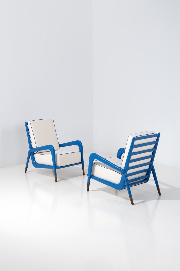 Gio Ponti (1891-1979) Pair of armchairs: Gio Ponti (1891-1979)Pair of armchairsLacquered walnut, brass and fabricEdited by Casa e GiardinoModel created in the 1930sH 85 × L 61 × W 83 cmExpertise conducted by the Gio Ponti Archives.