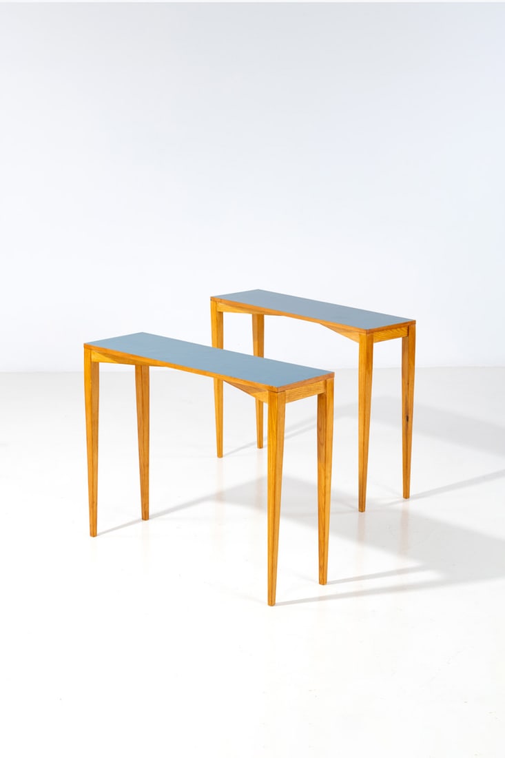 Gio Ponti (1891-1979) Pair of consoles: Gio Ponti (1891-1979)Pair of consolesAsh wood and melamineEdited by I.S.A.Model created in the 1950sH 79 × L 100 × W 30 cmNote: Model created for the Royal Hotel di PietraLigure.Expertise