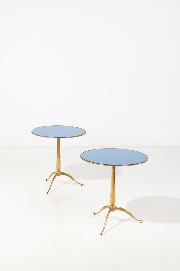 xx Osvaldo Borsani (1911-1985) Pair of side tables: xx Osvaldo Borsani (1911-1985)Pair of side tablesBrass and stained glassModel created circa 1960H 57,5 × Ø 54 cm