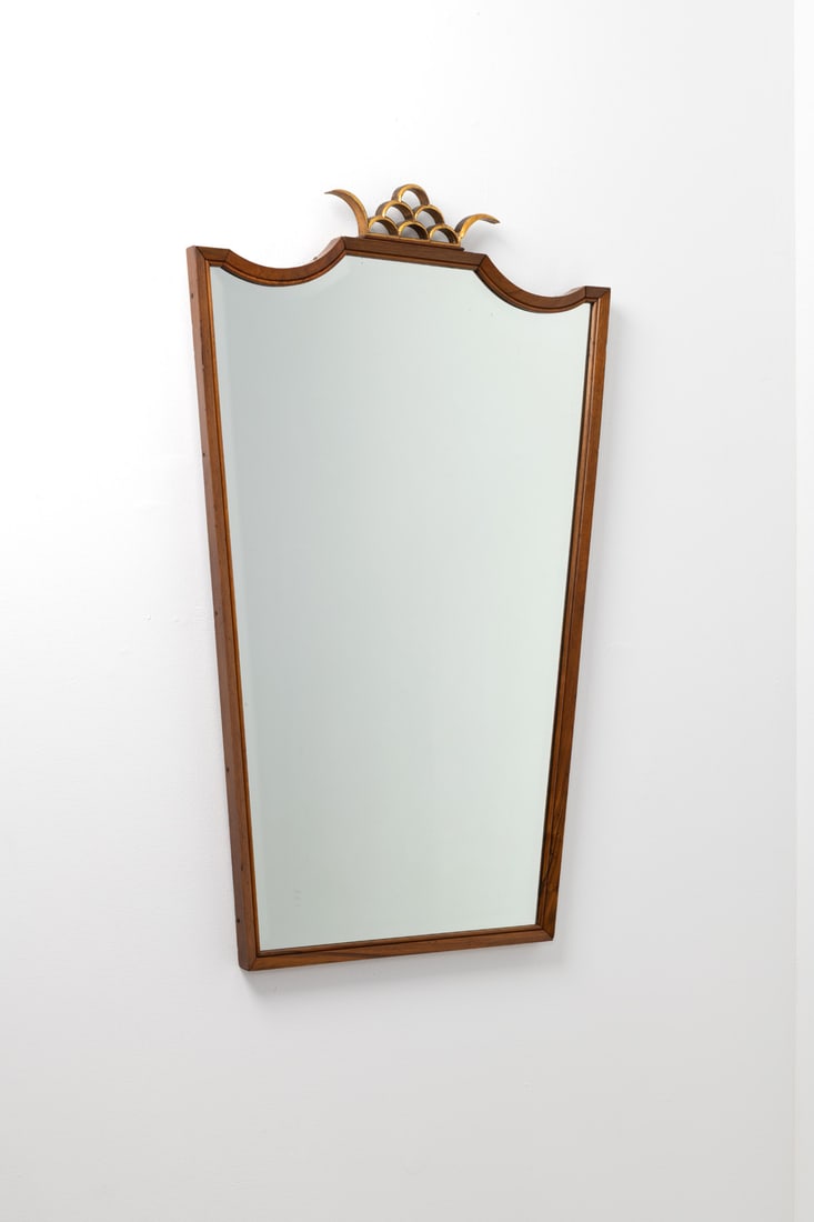 Gio Ponti (1891-1979) Mirror: Gio Ponti (1891-1979)MirrorWalnut and gilded woodModel created in the 1920sH 102 × L 64,5 × W 4,5 cmExpertise conducted by the Gio Ponti Archives.