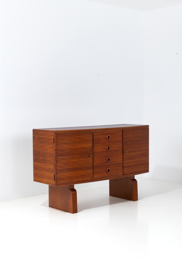 Gio Ponti (1891-1979) Sideboard: Gio Ponti (1891-1979)SideboardAsh wood and walnutEdited by Casa e GiardinoManufacturer’s hot stamp on the backModel created circa 1937H 97× L 151 × W 50 cmExpertise conducted by the
