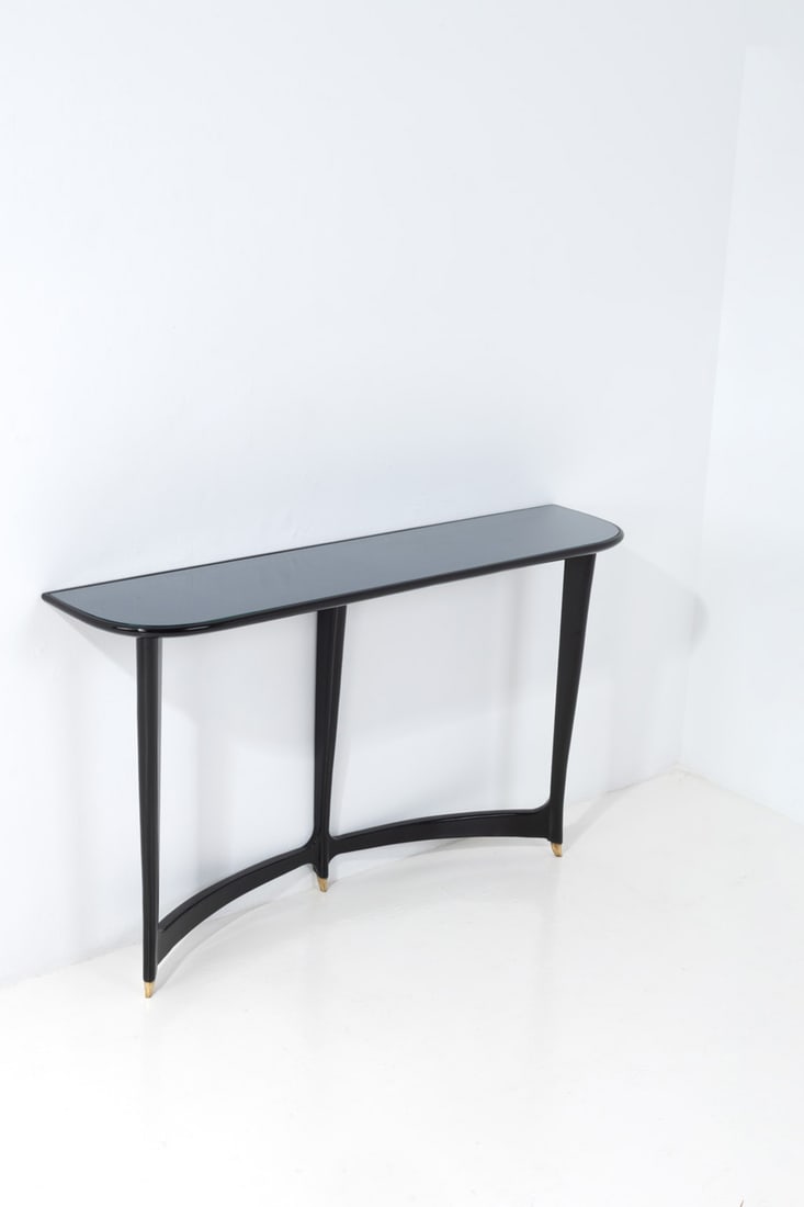 Guglielmo Ulrich (1904-1977) Console: Guglielmo Ulrich (1904-1977)ConsoleLacquered wood and glassModel created circa 1940H 88 × L 148 × W 35 cm