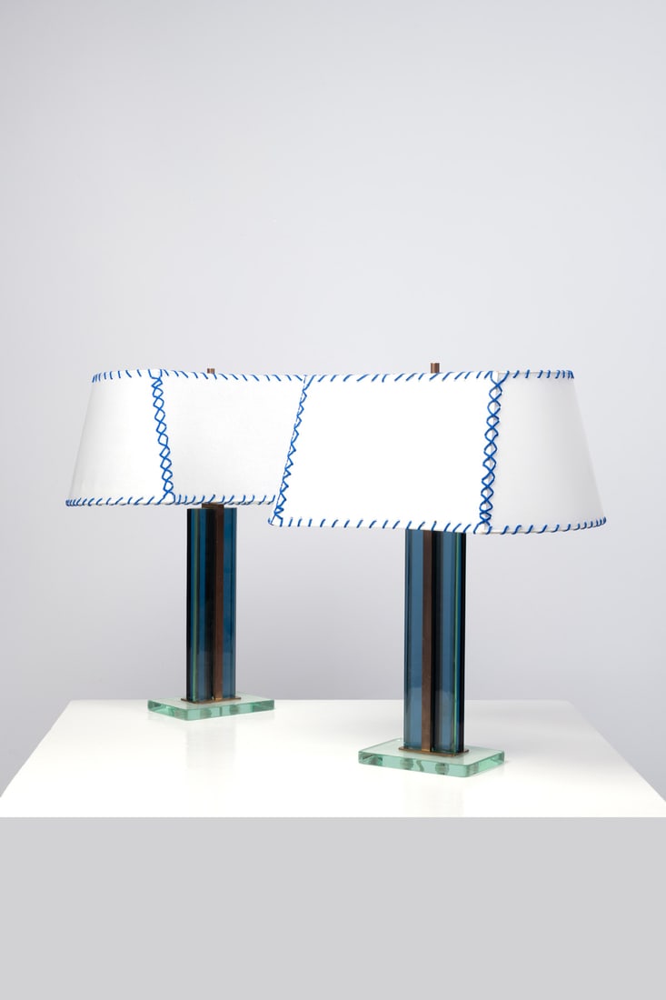 Pietro Chiesa (1892-1948) Pair of table lamps: Pietro Chiesa (1892-1948)Pair of table lampsGlass and chromed metalEdited by Fontana ArteModel created circa 1940H 59 × L 50 × W 33cm (with lampshade)H 59 × L 18 × W 13,5 cm (witho