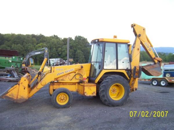 JOHN DEERE 310 D LOADER/BACKHOE W/CAB/HEAT: JOHN DEERE 310 D LOADER/BACKHOE WITH CAB AND HEAT, 4 IN 1 BUCKET. MACHINE STARTS RUNS AND OPERATES WELL. GOOD BRAKES, TRANSMISSION AND ENGINE RUNS WELL. SHOWS 2336 HOURS AND THE SERIAL # TO310DA780464