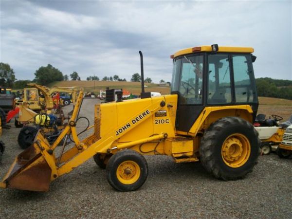 JOHN DEERE 210 C TRACTOR / LOADER W/CAB/HEAT "NICE: JOHN DEERE 210 C SKIP LOADER WITH CAB, HEAT, 3PT HITCH, AUXILLARY REMOTE OUTLET. DIESEL, POWERSTEERING, SHUTTLE SHIFT TRANSMISSION. TRACTOR STARTS, RUNS AND OPERATES AS IT SHOULD. NICE CLEAN MACHINE O