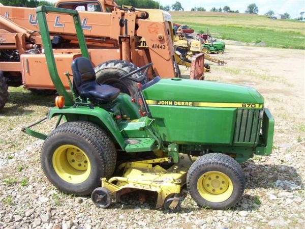 JOHN DEERE 670 4WD TRACTOR W/60 INCH MOWER - 7