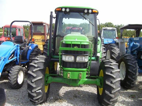NICE JOHN DEERE 6420 4WD TRACTOR W/CAB/AIR/LOADED: NICE JOHN DEERE 6420 4WD TRACTOR WITH CAB, HEAT, AIR, POWER QUAD TRANMSISSION WITH LEFT HAND REVERSER, 3PT, PTO, 2 REMOTE OUTLETS, LOADER VALVE IN CAB, RADIO, RACK AND PINION AXLES, VERY GOOD TIRES AL