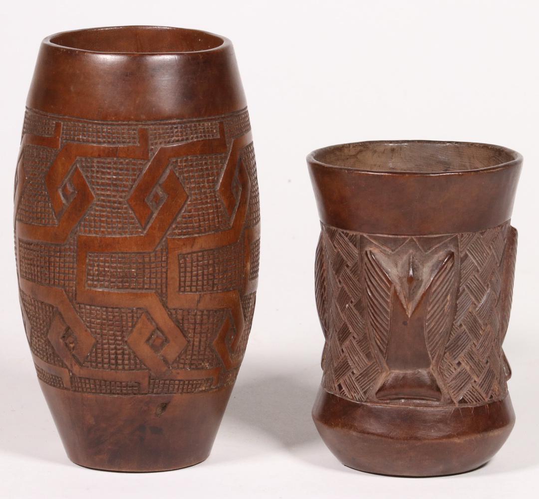 (2) AFRICAN WOODEN CUPS: Early 20th c. Carved Hardwood Cups, Kuba peoples, with geometric decoration, 5 3/4" x 3 1/4" & 4 1/4" x 3" diam. Good condition.